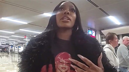 'RHOA's Posha Williams gets support from eyewitnesses while speaking with police after an incident onboard a flight home from BravoCon. | Entertainment Tonight