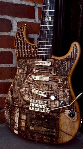 𝐂𝐢𝐧𝐝𝐲 𝐇𝐮𝐥𝐞𝐣 𝐂𝐮𝐬𝐭𝐨𝐦 𝐆𝐮𝐢𝐭𝐚𝐫𝐬 on Instagram: "This guitar is probably the most intense pyrography and inlay custom order I’ve taken on so far. Especially being that there are portraits of us on the front. @garytmoore101 ✨ This is Gary’s second custom Cindy guitar and with the first one being pyrography NYC themed t-model he wanted this one to match but with it being Carmine Street Guitars themed. The body on this beautiful baby is swamp ash from Rick’s old growth stock from th