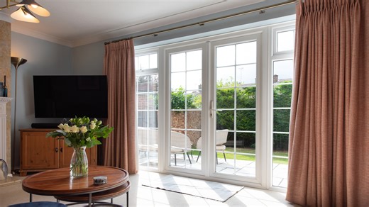 A Brilliant Curtain Rod Hack For Big Windows And Small Budgets - House Digest