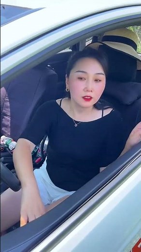 A Female Driver Demonstrates Classic Single-Lane Bridge Passing Technique On A Narrow Road.