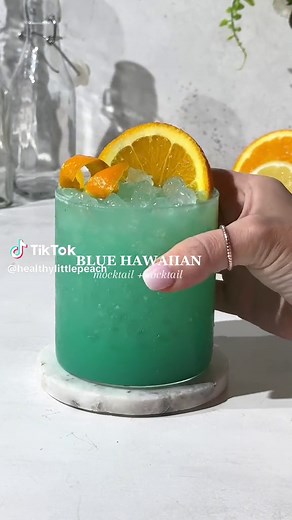 Mocktails are here to stay! If you are looking for a fancy drink for summer, you ✨MUST✨give this Blue Hawaiian Mocktail a try. I am sticking with mocktails right now, but you can absolutely turn this into a cocktail using coconut rum or pineapple vodka. 🌺Blue Hawaiian Mocktail🍍 ▫️2 oz orange juice ▫️2 oz pineapple juice ▫️1 oz coconut water ▫️1-2 teaspoon Cream Of Coconut ( I used Coco Real) ▫️2 tsp blue curacao syrup (non alcoholic version) ▫️Lemon Lime soda ( I used a Lemon Lime Olipop. You 