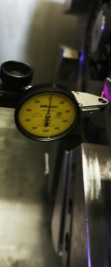 Dial indicator moving to check flatness and straightness