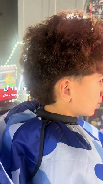 Mastering the Mid Taper Haircut Technique