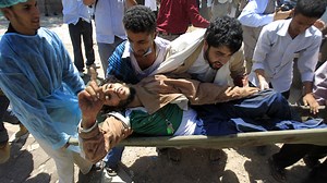 Yemen forces shell protest camp