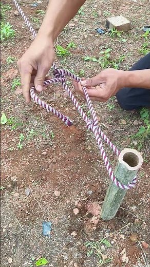 Setting up a tent outdoors, tent knotting techniques