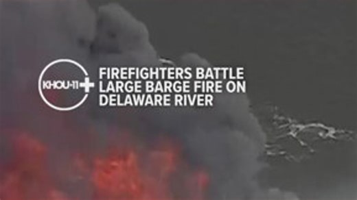 Firefighters battle large barge fire on Delaware River