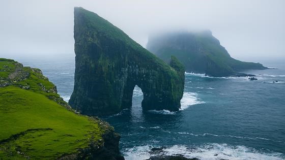 Drangarnir – Faroe Islands – Sea Stack Arch in Misty Coastal Landscape in 4K