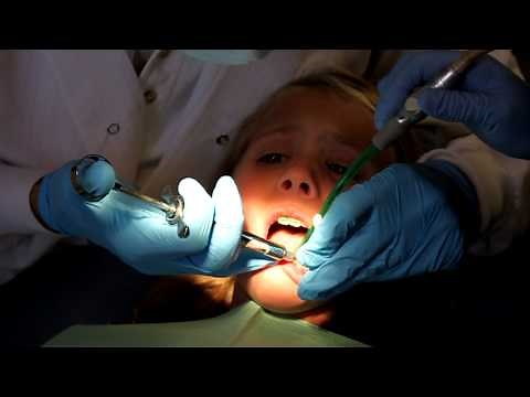 Elisa's second dental injection, for a cavity and tooth extraction...first part