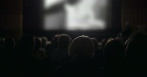 People watching film in the cinema