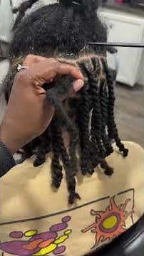 Learn how to use the loc smithing method to get rid of frizzy locs by @daniieehb.