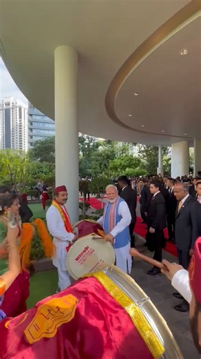 Prime Minister Narendra Modi tries his hands on a dhol. Members of the Indian diaspora welcomed PM Modi on his arrival in Singapore. #PMModi #IndianDiaspora #Singapore #PMModiInSingpore #News | TIMES NOW
