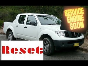 How to reset the service in the Nissan Frontier?