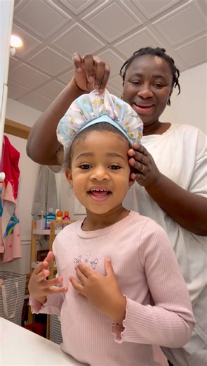 This is what her hair looks like the morning after my attempt to give her a silk press. Not perfect but most important thing is that is she happy and smiling | A Life Less Scripted