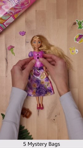Mattel Disney Princess Rapunzel Fashion Doll Set, Spin & Reveal with 11 Surprises Including 5 Accessories, 5 Stickers & Play Scene, Inspired by Movie