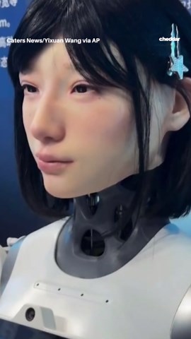 Robots with realistic artificial faces drew crowds at the 2025 World Robot Conference