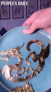20K views · 750 reactions | What is the use of a broken plate? An even more beautiful plate! Chinese artist restores a shattered dish to a decoration. | People's Daily, China | Facebook