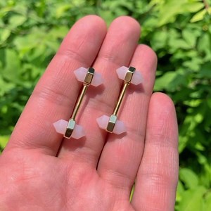 1.3M views · 2.8K reactions | They’re baaaack! ✨ We just love these little rosy crystals  Shop the set  https://www.bodycandy.com/search?view=spring&q=gold+tone+pink+gem | Body Candy Body Jewelry | Facebook