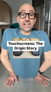 Touchscreens: The Origin Story Video description: in this video, Spencer is seen in various parts of his home, either standing or sitting on the ground. He’s also seen holding an iPhone and showing some of the features of a touchscreen. When he mentions the person who created touchscreen technology, a photo of them pops up on the screen. They are a white man with light brown hair. When he mentions the first touchscreen technology photo comes up of what looks like a keyboard split in half with pi
