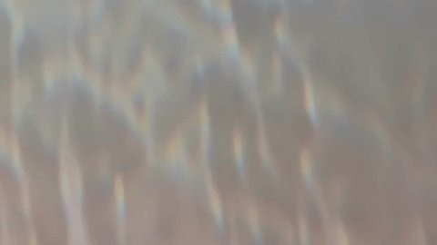 clip-4007814307-colorful-water-light-reflections-projected-onto-ceiling