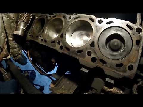 2003 Ford 6.0 Powerstroke Replacing Damaged Pistons in Cylinder 3, and 5 from Dropped Glow Plug Tip