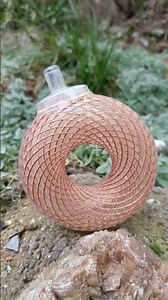 Rodin Coil featuring a specific winding pattern based on "Vortex-Based Mathematics" (VBM).