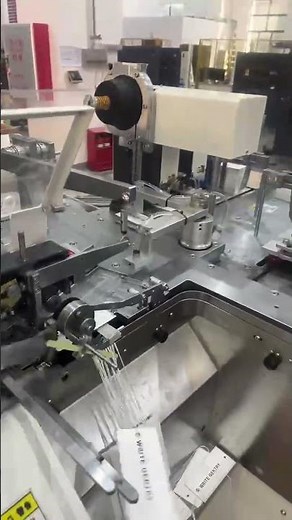 High-Speed Automatic Double Pieces Hang Tag Stringing and Knotting Machine With Eyelet Attaching