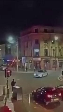 A car began drifting in the centre of a Middlesbrough crossroads as fireworks were launched in the street. Tyres screeched and the engine of a white BMW roared as it performed 'donuts' in the middle of the traffic light junction. Boxes of booming pyrotechnics were simultaneously lit at the junction of Corporation Road and Albert Road, near Turtle Bay. | Teesside Live