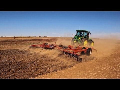 Disk Harrow In Action: Preparing The Soil For Planting