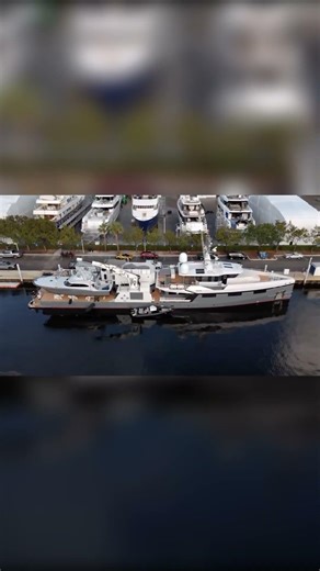 Boom! 50 footer Gameboat on 175 mothership, lifted with ship crane. On deck!!