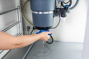 Garbage Disposal Leaking? 8 Reasons   Fixes