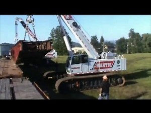 2 Crawler Cranes off loading a Railcar Turntable