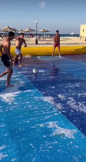Slippery Water Slide Soccer Fun