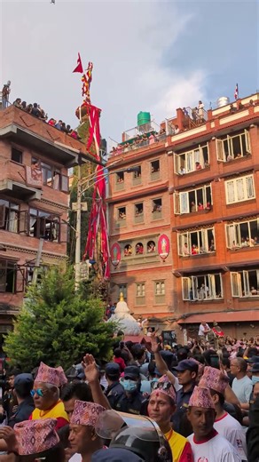Power of unity. Hundreds of people pull a 60 ft tall chariot through the alleys of Patan.