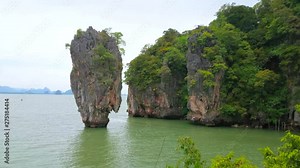 The unique landscape of Ko Ta Pu island - the karst tower in Ao Phang Nga national park, located next to limestone James Bond Island (Khao Phing Kan), and Ko Raya Ring island, Thailand