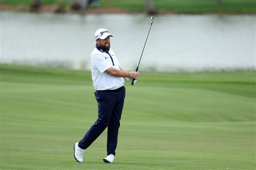 Shane Lowry mocks "Dr. Chippinski" Min Woo Lee after putting on a chipping show at the Cognizant Classic