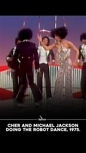 topvoice on Instagram: "In 1975, a 16-year-old Michael Jackson performed his now-famous robot dance on The Cher Show, during a medley with Cher and The Jackson 5. Set to their hit Dancing Machine, the performance helped popularize robotic dance moves across the U.S. This moment not only showed MJ’s rising star power but also marked a key point in pop culture, blending his electric stage presence with Cher’s prime-time influence."