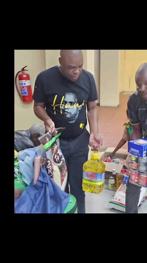 Distribution of Christmas food parcels to the less fortunate amongst us by Cde Jackie Macie.