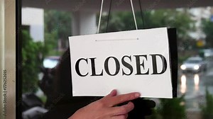 Turning Over Closed And Open Sign