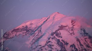 Mount Rainier, Washington circa-2019. Aerial view of Mount Rainier at sunset. Shot from helicopter with Cineflex gimbal and RED 8K camera. Stock Video