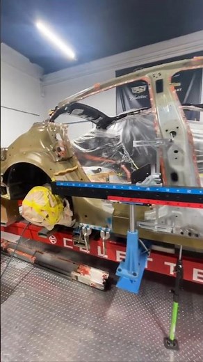 Tesla mounted on a Celette Sevenne frame machine with the side gantry