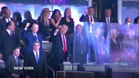 Trump draws cheers and boos while marking 9/11 by attending a New York Yankees game