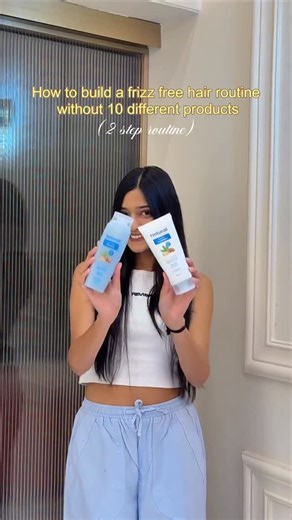 Akshika Golya on Instagram: "I stopped overcomplicating my hair routine and the frizz finally did too. @naturali.in 🌟 Just two steps, no heat styling, and my hair stays smooth and manageable even in humidity. Sometimes less really works better 🤍 Comment “EASY” for the links. [ anti frizz, naturali, best shampoo for dry and frizzy hair, for indian hair type, sulphate free, argan oil, 100 hours of frizz control, hyaluronic acid shampoo, best conditioner for frizzy hair ] #explorepage #haircarero