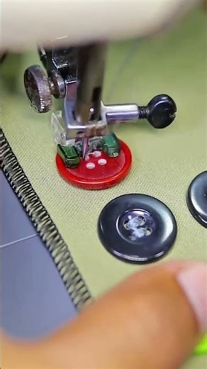 the process of sewing buttons on clothes using modern tools #construction #popular #shorts