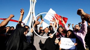 Democracy Welcomed, but Risk Remains