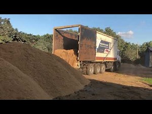 Paddy husk unloading with KEITH Walking Floor: An automatic unloading technology for Trucks
