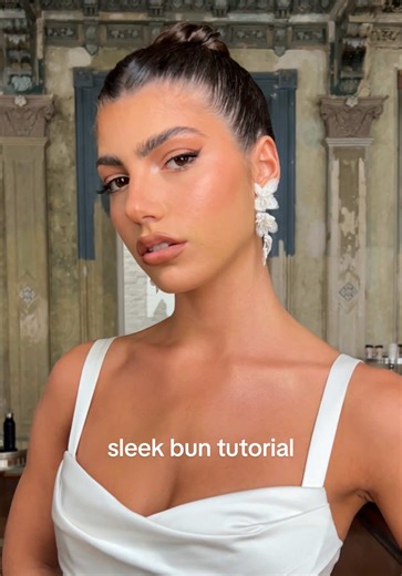 How to Create a High Sleek Centre Part Bun