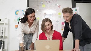 Closeup of young beautiful cooperate manager tells good new to coworker at business meeting room in front of creative brain storming mind map. Getting promotion, receiving bonus. Immaculate.