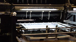 Printing machine works, rolling printed newspaper in typography facility