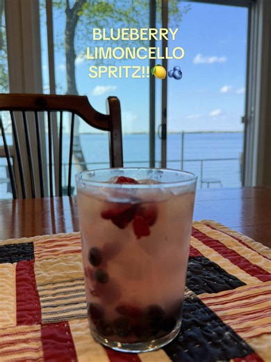 blueberry limoncello spritz!🍋🫐recipe below⬇️ • 1 part limoncello • 2 parts procecco • 1 part san pellegrino • fresh blueberries muddled (can add other fruit like I did with raspberries!!) • 1 or 2 basil leaves muddled • add ice & enjoy!!! #spritz #limoncellospritz #cocktails #bartender