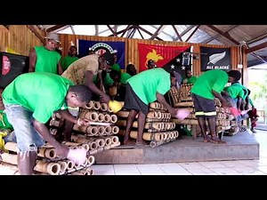 Traditional bamboo bands & sing sing on tropical island of Bougainville, Papua New Guinea